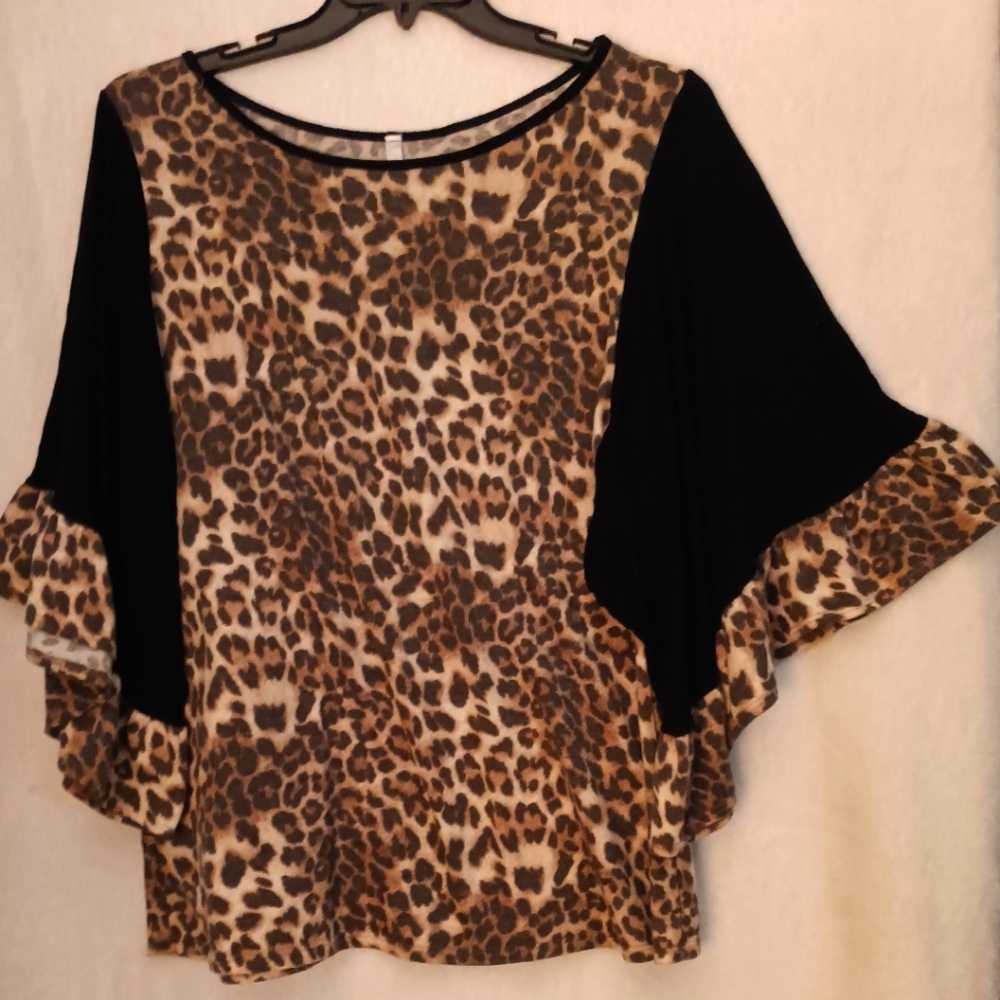 EUC. Animal print ruffled sleeve blouse. Size Large